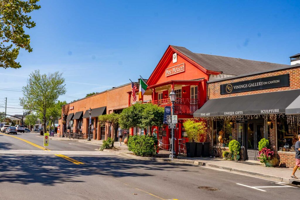 Red Mac McGee pub beside Vinings Gallery on Canton, with restaurant patios along Canton Street