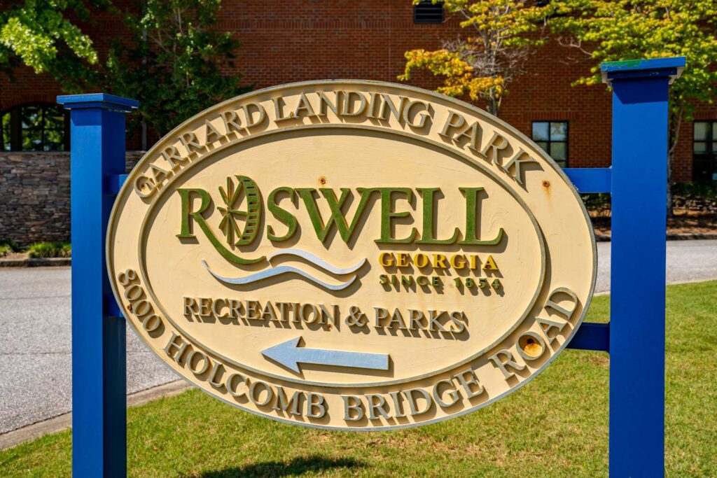 Garrard Landing Park entrance sign displaying Roswell Recreation and Parks and 8000 Holcomb Bridge Road.